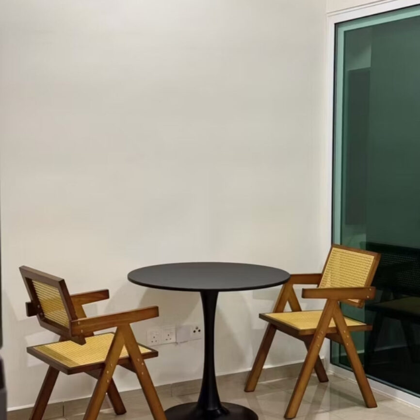 solid wood Dining chair made from teak wood and rattan, placed in a room. Samz Design home of custom furniture Malaysia. Two chairs with dining table.